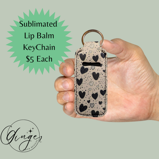 Hand holding a keychain with heart pattern, text about sublimated lip balm keychain, and Ginger Design logo.