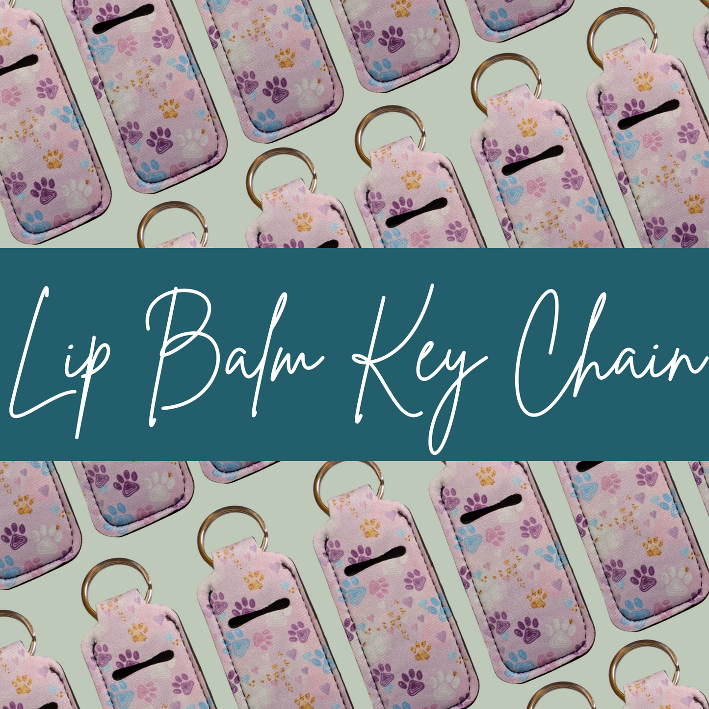 Lip balm key chains with paw print design on a light green background