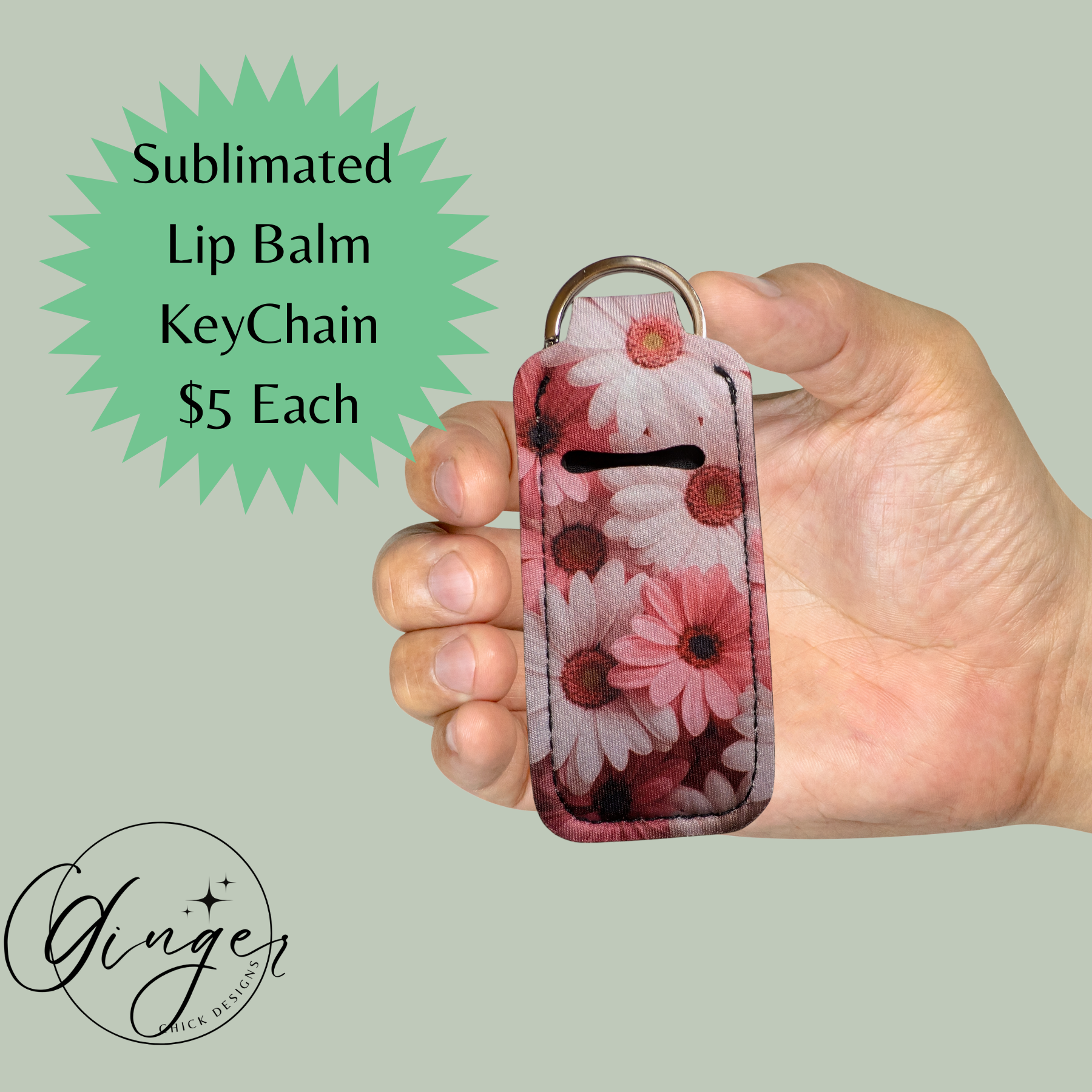 Hand holding a floral sublimated lip balm keychain with promotional text on a light green background.