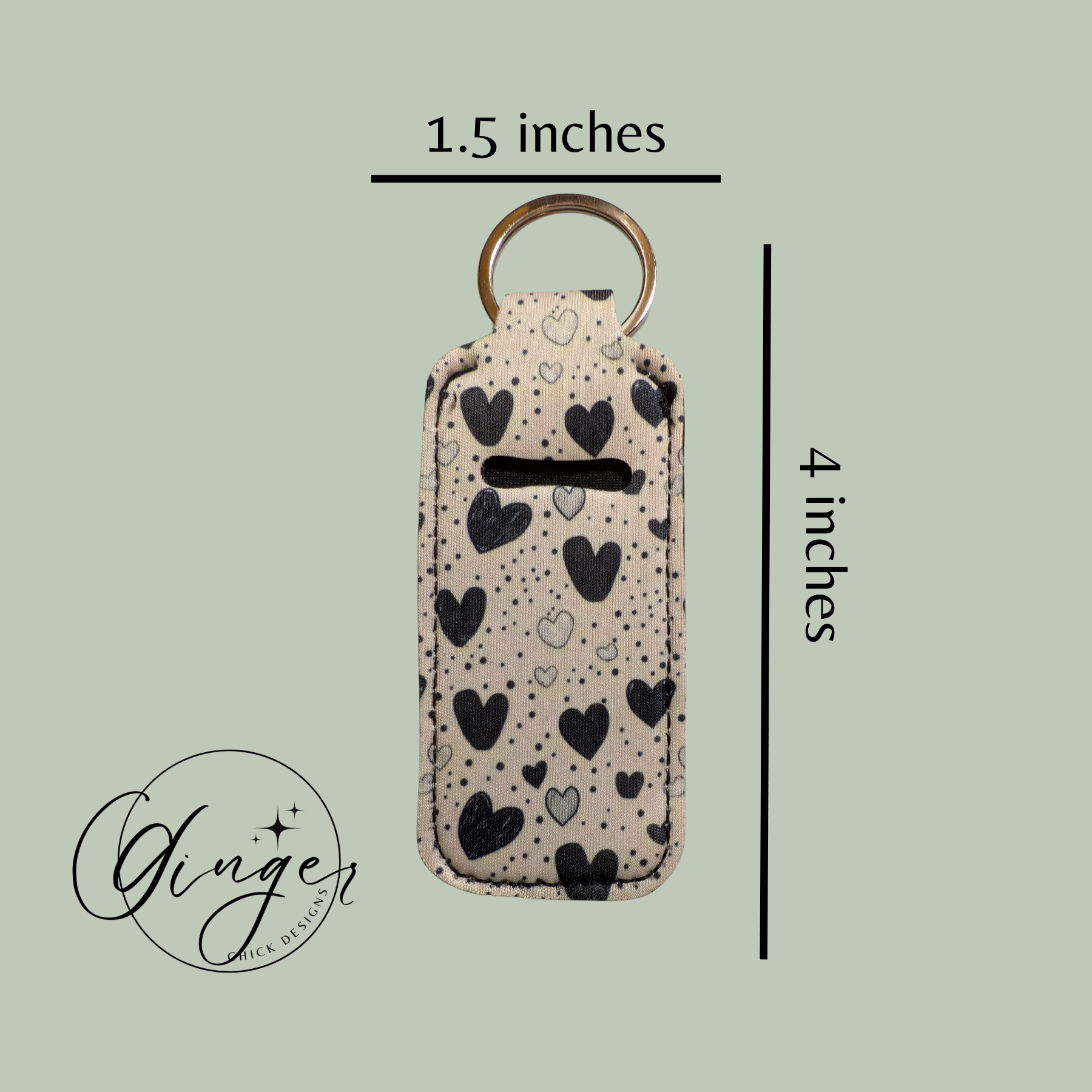 Keychain case with heart pattern and dimensions on a light green background