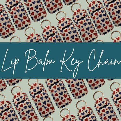 Lip balm key chains with heart pattern on a light blue background