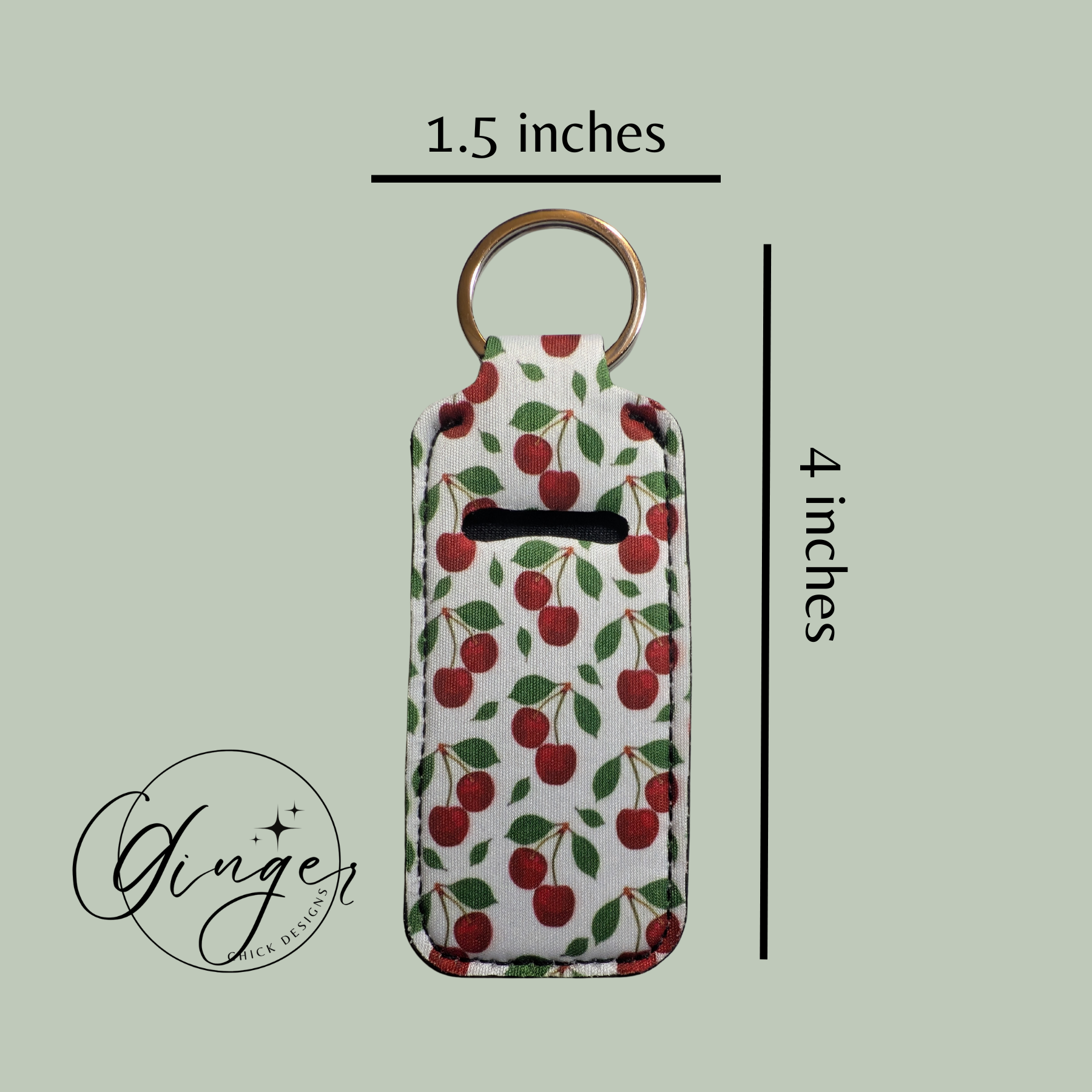 Keychain with cherry pattern and measurements on a light green background