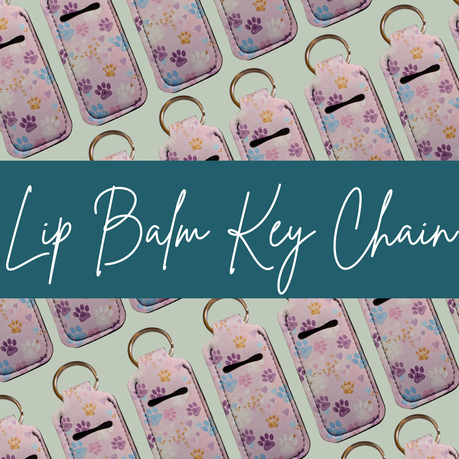 Lip balm key chains with paw print design on a light green background